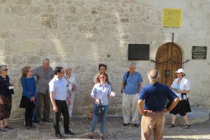 In front of a former ‘New Method’ school for the sciences set up by Crimean Tartar intellectual Ismail Gasprinskiy. The chain over the door was so that students would bend low to enter, out of respect to knowledge.