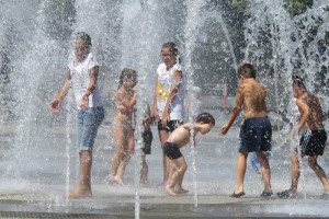 Kids play at a public fountain in Krasnodar, like kids in the U.S. would.