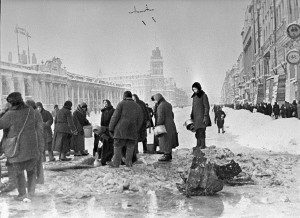 Residents collecting water from shell holes in St Petersburg.